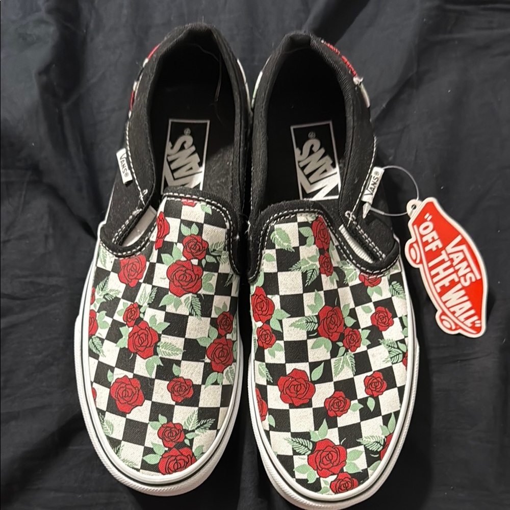 Vans Black and Red Slip-On Sneakers with Checkerboard Design